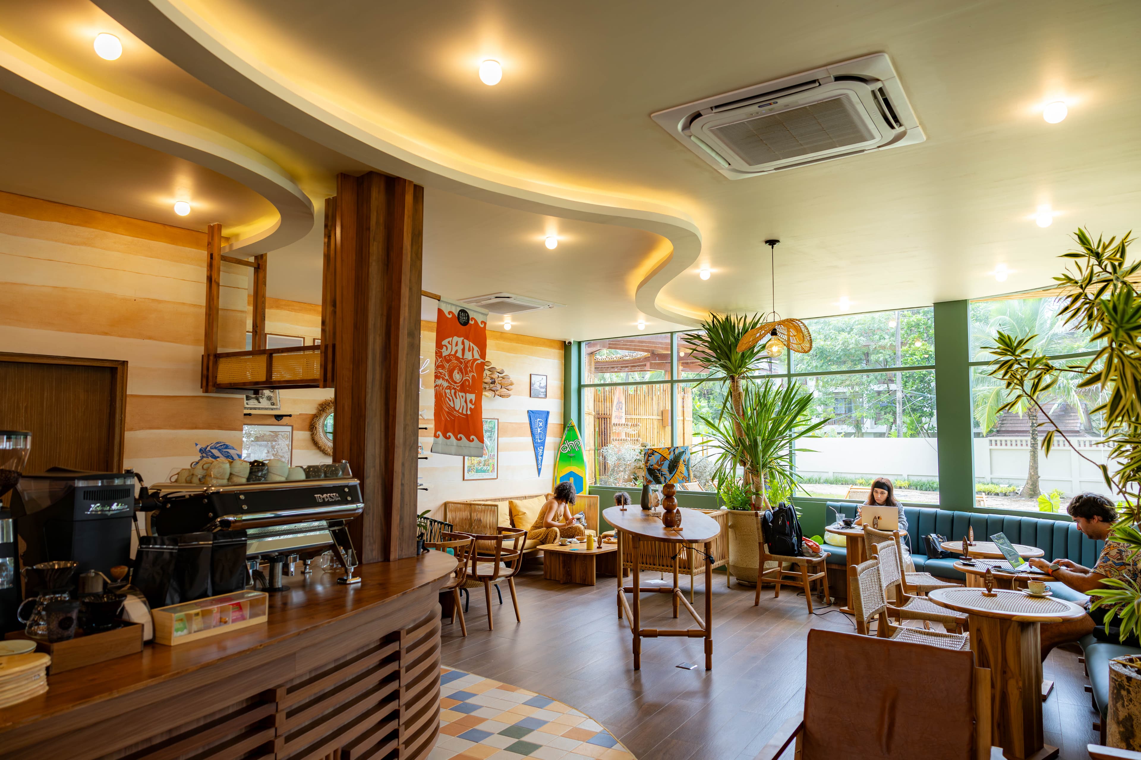 Plant-filled Salt Surf cafe overlooking Coral Bay